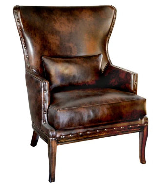 A luxurious brown leather chair that looks old, but also has the potential to age gracefully in a modern contemporary home. 