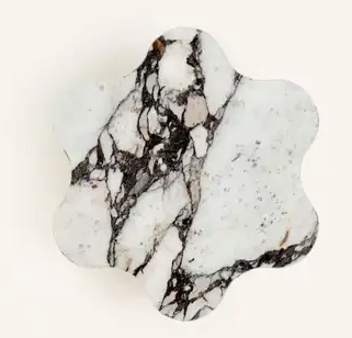 A unique, 6 pointed marble slab, where the points are rounded on each edge. 
